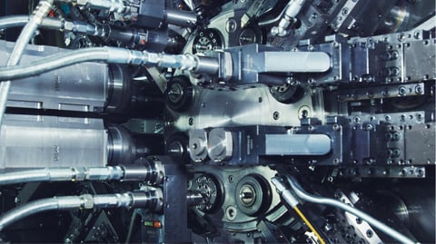 Automating a multi-spindle lathe with collets: the advantages of a bar feeder